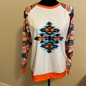 Long sleeve Western/Aztec graphic tee.
